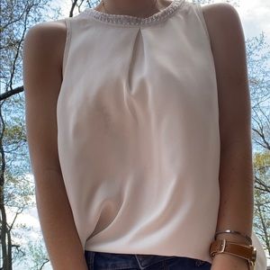 Light blouse with statement neckline